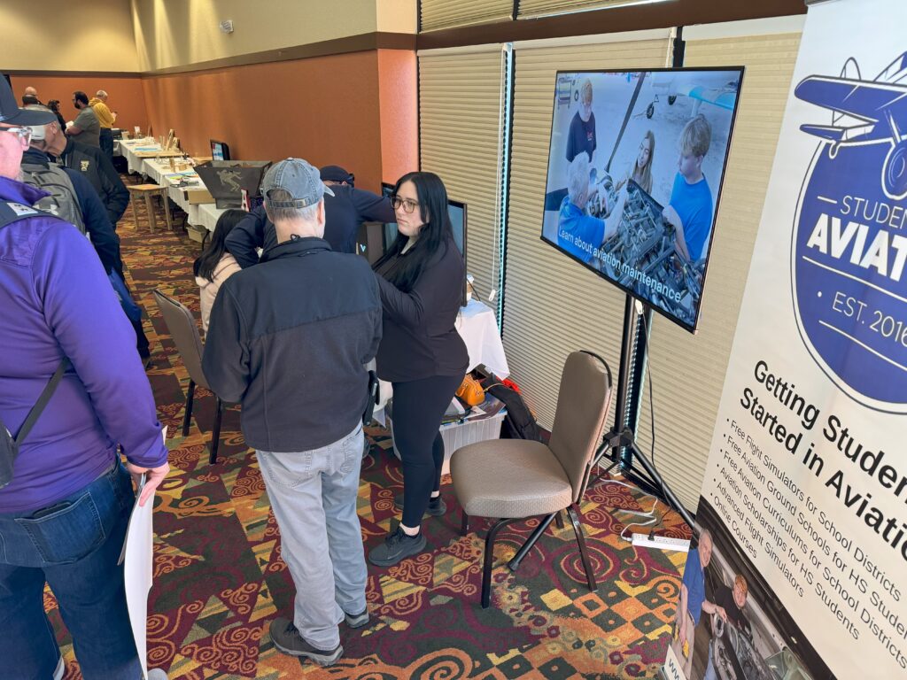 Anna talking with teachers at the WTEA Convention in Wisconsin Dells