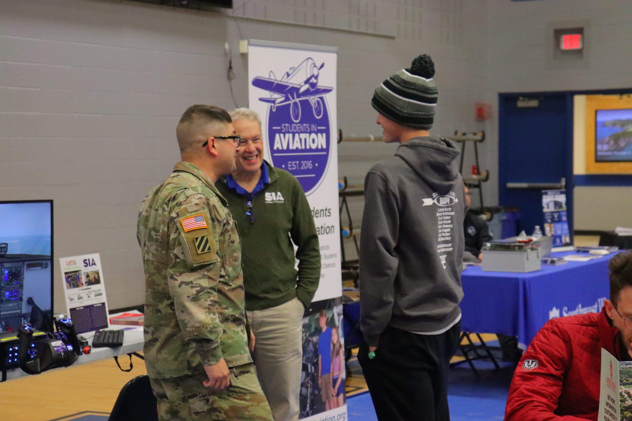 Student discusses aviation with SIA and Wisconsin National Guard representative